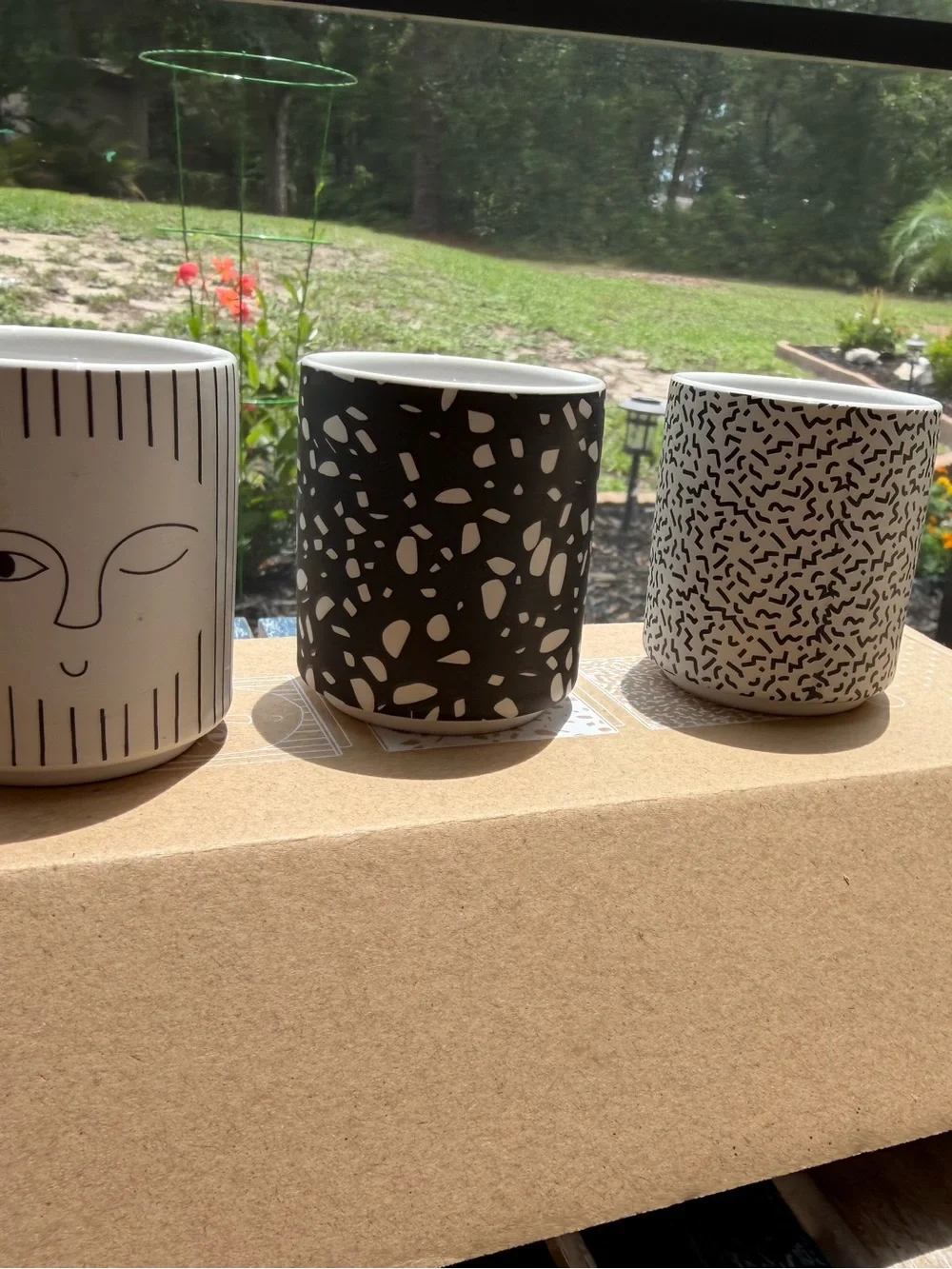OYOY Egg People set of three Ceramic Egg Holder - Black & White